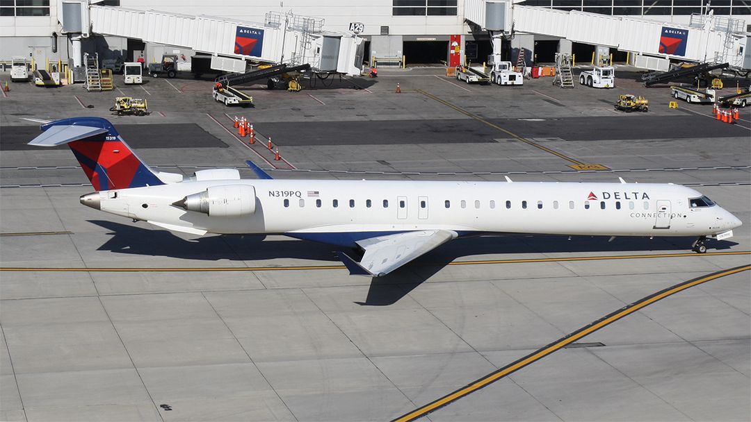 Photo of N319PQ - Delta Connection Mitsubishi CRJ-900 at DTW on AeroXplorer Aviation Database